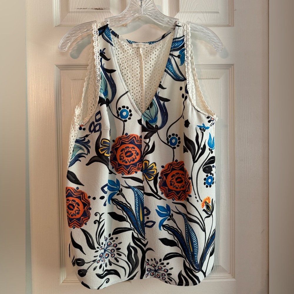 ANTHROPOLOGIE

Summer Must Have 

OH SO PRETTY TANK 
EYELET BACK & TRIM